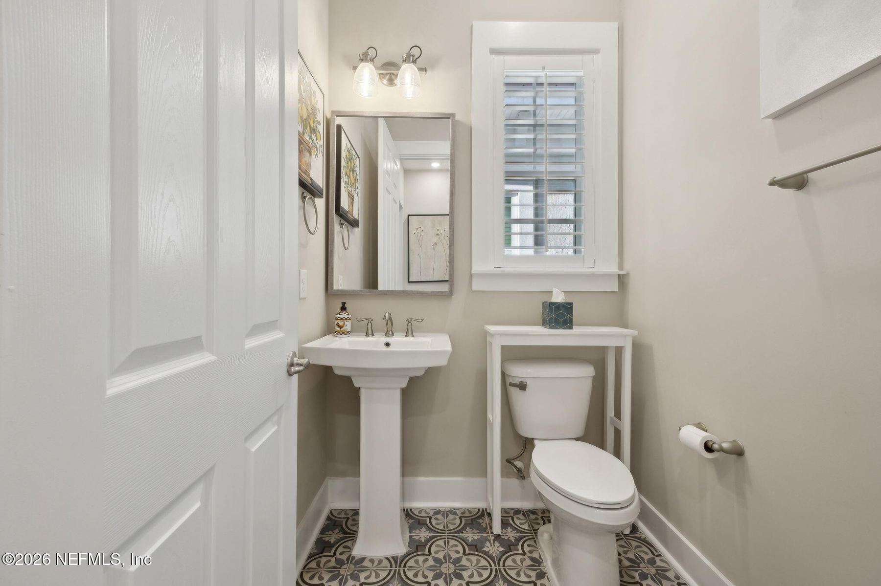 Powder room with pedestal sink